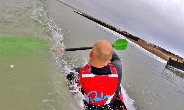 Getting back aboard your sit on top kayak after a wipe-out in waves<input type="hidden" class="is-post-family-safe" value="true">