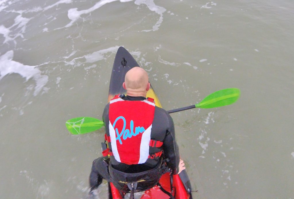 Getting back aboard your sit on top kayak after a wipe-out in waves 8