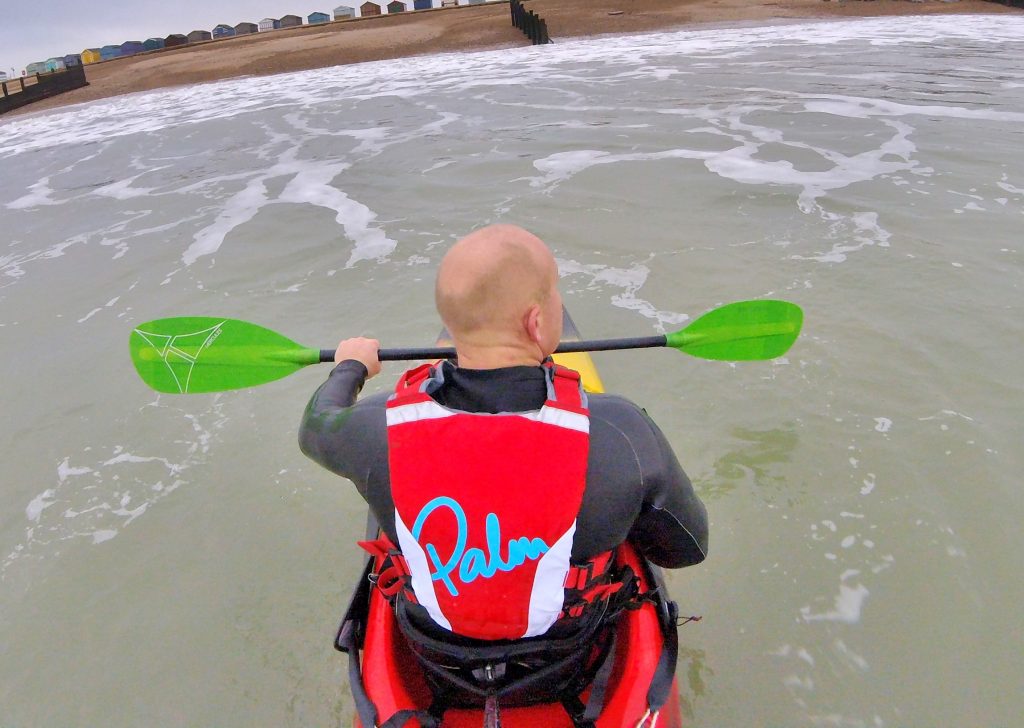 Getting back aboard your sit on top kayak after a wipe-out in waves 9